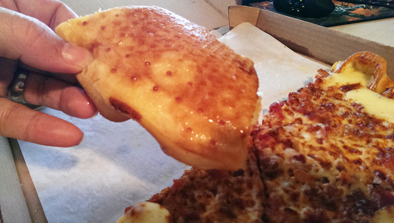 Illustration for article titled Pizza Hut's Crazy Cheesy Crust Pizza: The Snacktaku Review